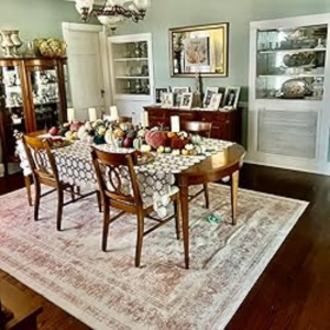 The kitchen is behind the dining room